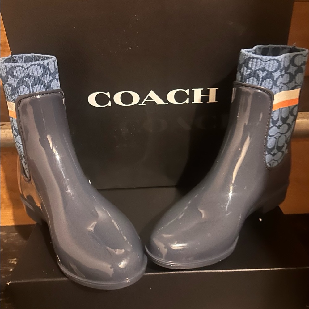 They are navy blue coach rain boots. Super cute